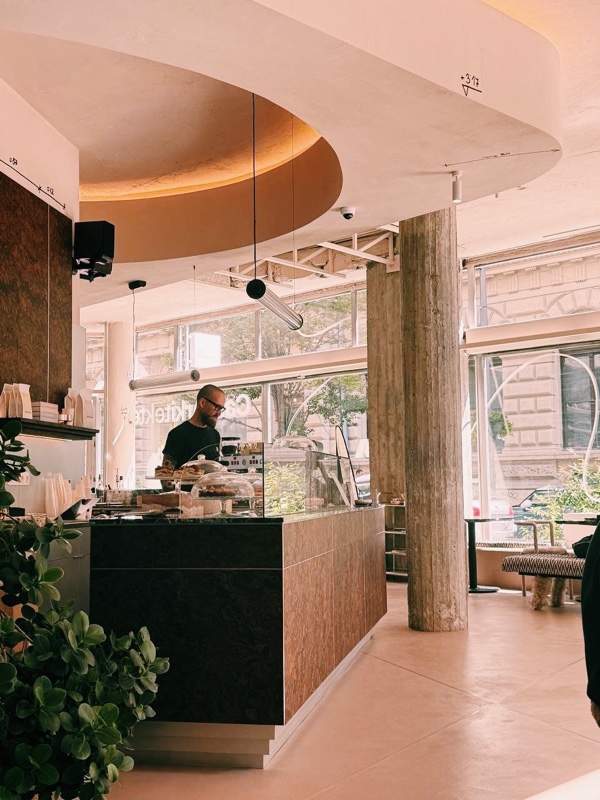 Bar counter with curved ceiling and panoramic windows