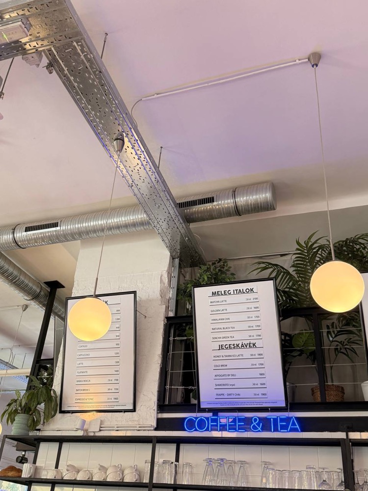Coffee & Tea menu and neon sign